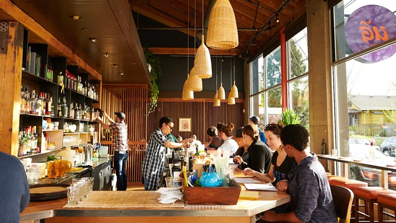 Diners inside Eem restaurant on Williams Street in Portland