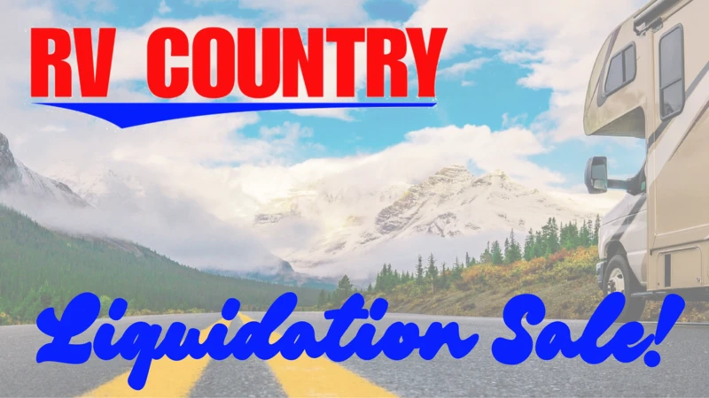 A promotional photo of an RV driving down the road with a mountain in the background. The RV Country logo is at the top with "Liquidation Sale!" in blue cursive at the bottom.