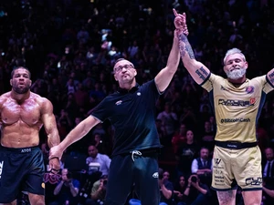 winner with hand raised at ADCC event