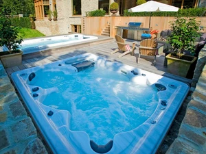 photo of hot tub in nice yard