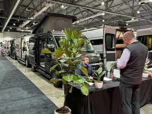 Attendee talking to dealer at RV Show