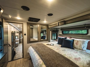 Photo of the inside of a nice RV bedroom