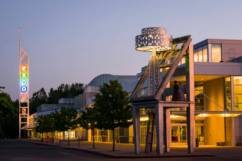 photo of the building at night with expo neon sign.