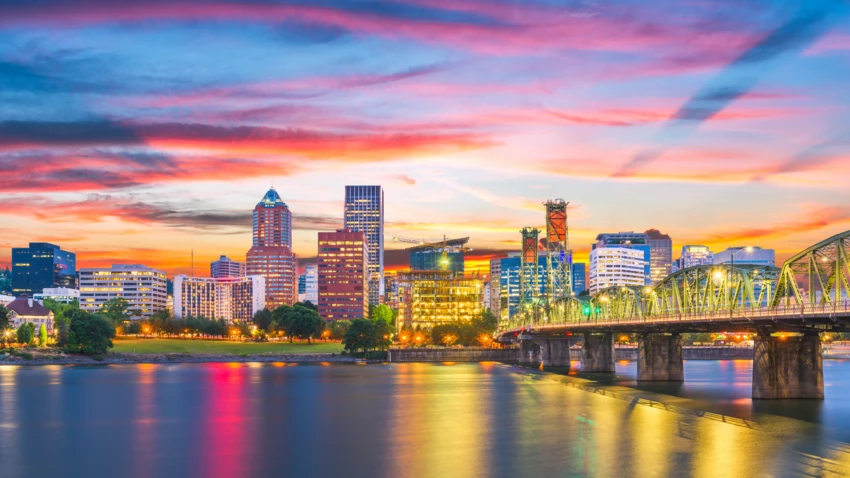 View of the Portland skyline at sunset from the east side of the Willamette river